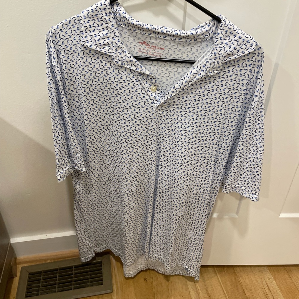 Large Peter millar shirt. In good condition. No stains or tears.